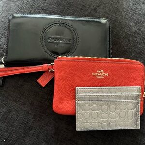 Bundle is 3 Coach wallets. 3 for one price!